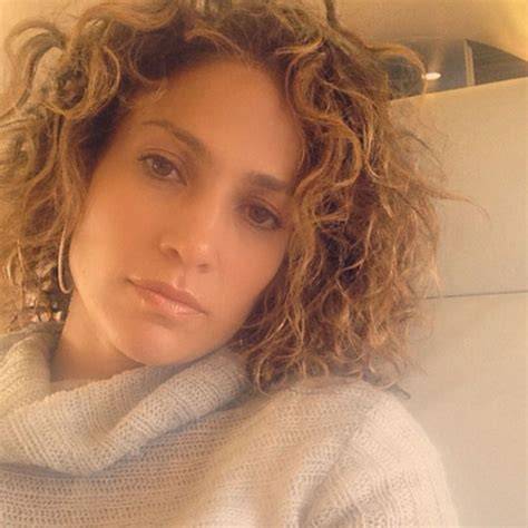 Jennifer Lopez curly hair travel selfie