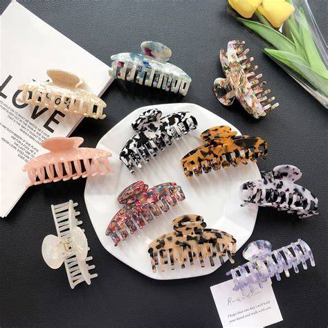 illustrative tortoiseshell acetate clips on grey hair
