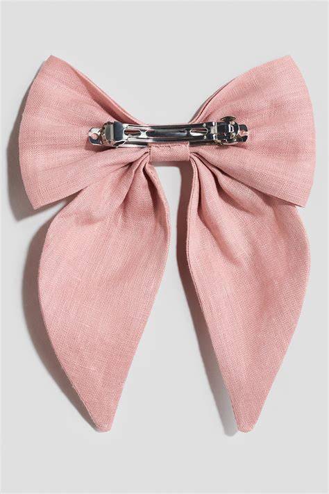 pink linen hair clip close-up texture